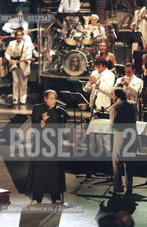 Milan, October 21, 1999. Italian pop singer Adriano Celentano on the set of his TV program Francamente me ne infischio / Milano, 21 ottobre 1999. Il cantante Adriano Celentano sul set del suo programma televisivo Francamente me ne infischio - ©Marcello Mencarini/Rosebud2