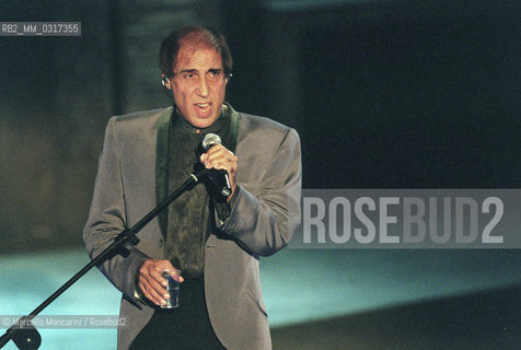 Milan, October 24, 1999. Italian pop singer Adriano Celentano on the set of his TV program Francamente me ne infischio / Milano, 24 ottobre 1999. Il cantante Adriano Celentano sul set del suo programma televisivo Francamente me ne infischio - ©Marcello Mencarini/Rosebud2
