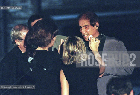 Milan, October 24, 1999. Italian pop singer Adriano Celentano and his wife Claudia Mori on the set of his TV program Francamente me ne infischio / Milano, 24 ottobre 1999. Il cantante Adriano Celentano e sua moglie Claudia Mori sul set del suo programma televisivo Francamente me ne infischio - ©Marcello Mencarini/Rosebud2