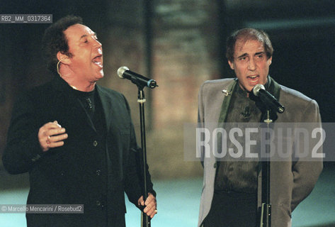 Milan, October 24, 1999. Italian pop singer Adriano Celentano on the set of his TV program Francamente me ne infischio with British singer Tom Jones / Milano, 24 ottobre 1999. Il cantante Adriano Celentano sul set del suo programma televisivo Francamente me ne infischio con il cantante Tom Jones - ©Marcello Mencarini/Rosebud2