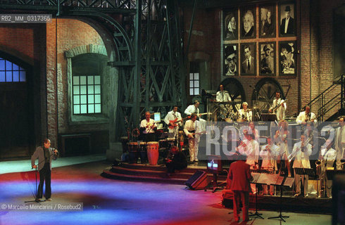 Milan, October 28, 1999. Italian pop singer Adriano Celentano on the set of his TV program Francamente me ne infischio / Milano, 28 ottobre 1999. Il cantante Adriano Celentano sul set del suo programma televisivo Francamente me ne infischio - ©Marcello Mencarini/Rosebud2