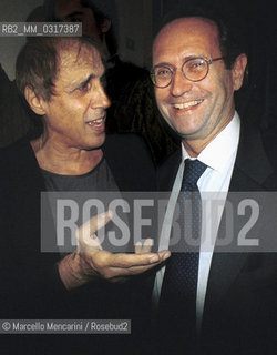 Milan, October 28, 1999. Italian pop singer Adriano Celentano on the set of his TV program Francamente me ne infischio with President of RAI public television Roberto Zaccaria / Milano, 28 ottobre 1999. Il cantante Adriano Celentano sul set del suo programma televisivo Francamente me ne infischio con il presidente della RAI radiotelevisione italiana Roberto Zaccaria - ©Marcello Mencarini/Rosebud2