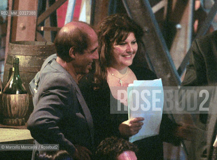 Milan, October 28, 1999. Italian pop singer Adriano Celentano on the set of his TV program Francamente me ne infischio with his wife Claudia Mori / Milano, 28 ottobre 1999. Il cantante Adriano Celentano sul set del suo programma televisivo Francamente me ne infischio con sua moglie Claudia Mori - ©Marcello Mencarini/Rosebud2