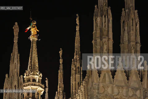 Milan June 2, 2008, Concert for Italian Republic Day in Piazza del Duomo of Andrea Bocelli and the Symphonic Orchestra “Giuseppe Verdi” conducted by Eugene Kohn. Spiers of the Cathedral lighted during the event / Milano, 2 giugno 2008, concerto per la  Festa della Repubblica di Andrea Bocelli con lorchestra Giuseppe Verdi diretta da Eugene Kohn. Guglie del Duomo illuminate durante levento - ©Marcello Mencarini/Rosebud2