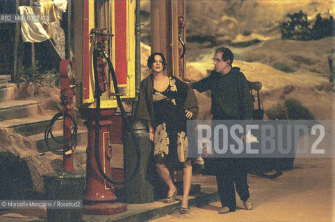 Milan, April 26, 2001. Italian pop singer Adriano Celentano on the set of his tv program 125 Milioni di Cazzate with actress Asia Argento / Milano, 26 aprile 2001. Il cantante Adriano Celentano sul set del suo programma televisivo 125 milioni di cazzate con lattrice Asia Argento - ©Marcello Mencarini/Rosebud2