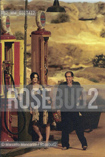 Milan, April 26, 2001. Italian pop singer Adriano Celentano on the set of his tv program 125 Milioni di Cazzate with actress Asia Argento / Milano, 26 aprile 2001. Il cantante Adriano Celentano sul set del suo programma televisivo 125 milioni di cazzate con lattrice Asia Argento - ©Marcello Mencarini/Rosebud2