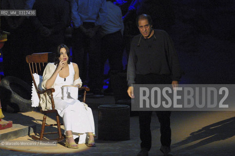 Milan, May 4, 2001. Italian pop singer Adriano Celentano on the set of his tv program 125 Milioni di Cazzate with actress Asia Argento / Milano, 4 maggio 2001. Il cantante Adriano Celentano sul set del suo programma televisivo 125 milioni di cazzate con lattrice Asia Argento - ©Marcello Mencarini/Rosebud2