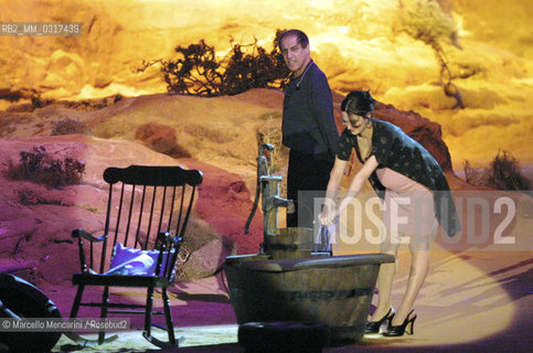 Milan, April 26, 2001. Italian pop singer Adriano Celentano on the set of his tv program 125 Milioni di Cazzate with actress Asia Argento / Milano, 26 aprile 2001. Il cantante Adriano Celentano sul set del suo programma televisivo 125 milioni di cazzate con lattrice Asia Argento - ©Marcello Mencarini/Rosebud2