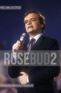 Sanremo Music Festival, 1990. Italian pop singer Gianluca Guidi performing his song Secondo te, that will finish third in the New Proposals Category / Festival doi Sanremo 1990. Gianluca Guidi canta Secondo te, che si classificherà terza nella categoria Nuove proposte - ©Marcello Mencarini/Rosebud2