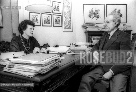 Italian lawyer and womens rights advocate Tina Lagostena Bassi in her office with her husband, lawyer Vitaliano Lagostena (1979) / Lavvocato Tina Lagostena Bassi, impegnata nella difesa dei diritti delle donne, nel suo ufficio con il marito, lavvocato Vitaliano Lagostena (1979) - ©Marcello Mencarini/Rosebud2