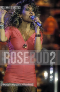 Sanremo Music festival 1991. Italian pop singers jo Squillo performing th song Siamo Donne with Sabrina Salerno / Festival di Sanremo 1991. Jo Squillo canta Siamo donne in duo con Sabrina Salerno - ©Marcello Mencarini/Rosebud2
