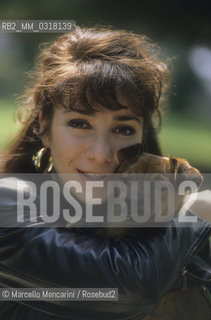 Milan, 1990. Italian soprano Tiziana Fabbricini with her dog / Milano, 1990. Il soprano Tiziana Fabbricini con il suo cane - ©Marcello Mencarini/Rosebud2