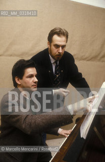 Rome Opera House, 1989. Italian composer Lorenzo Ferrero and bass-baritone Roberto Scandiuzzi during a rehearsal of Charlotte Corday, on occasion of celebration of French Revolution bicentenaruy / Teatro dellOpera di Roma, 1989. Il compositore Lorenzo Ferrero e il baritono Roberto Scandiuzz durante le prove di Charlotte Corday, in occasione della celebrazione del bicentenario dalla rivoluzione francese - ©Marcello Mencarini/Rosebud2