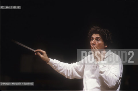 Rome Opera House, 1983. Italian conductor Gabriele Ferro performing a rehearsal / Teatro dellOpera di Roma, 1983. Il direttore dorchestra Gabriele Ferro mentre dirige una prova - ©Marcello Mencarini/Rosebud2