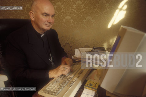 Vatican City, 1999. Archbishop John Foley at computer  / Città del Vaticano, 1999. Larcivescovo John Foley al computer - ©Marcello Mencarini/Rosebud2