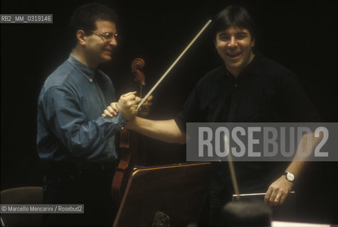 Rome, Pius XII Auditorium (concert hall of the Santa Cecilia Academy Orchestra), 1995. Italian conductor Daniele Gatti performing a rehearsal / Roma, Auditorium Pio XII (sede dei concerti dellorchestra dellAccademia nazionale di Santa Cecilia), 1995. Il direttore dorchestra Daniele Gatti mentre dirige una prova - ©Marcello Mencarini/Rosebud2