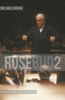 Italian conductor and composer Gianandrea Gavazzeni performing, about 1980 / Il direttore dorchestra e compositore Gianandrea Gavazzeni durante un concerto, 1980 circa - ©Marcello Mencarini/Rosebud2