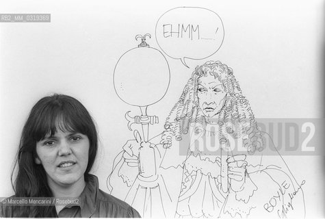Lucca, 1984. Italian cartoonist Cinzia Ghigliano posing next to one of his drawing / Lucca, 1984. La fumettista Cinzia Ghigliano posa accanto a un suo disegno -
 ©Marcello Mencarini/Rosebud2