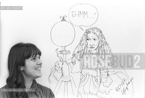 Lucca, 1984. Italian cartoonist Cinzia Ghigliano posing next to one of his drawing / Lucca, 1984. La fumettista Cinzia Ghigliano posa accanto a un suo disegno -
 ©Marcello Mencarini/Rosebud2