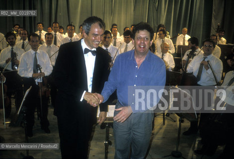 Gibellina (Trapani), 1994. Composer Philip Glass and conductor Sandro Gorli during the rehearsals before the premiere of the opera for ensemble and film La Belle et la Bête / Gibellina (Trapani), 1994. Il compositrore Philip Glass e il direttore dorchestra Sandro Gorli durante le prove per la prima dellopera La belle et la bête - ©Marcello Mencarini/Rosebud2