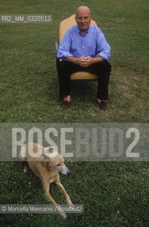 Marino (Rome), 1991. German composer Hans Werner Henze with a dog in the garden of his house / Marino (Roma), 1991. Il compositore Hans Werner Henze con un cane nel giardino della sua casa - ©Marcello Mencarini/Rosebud2