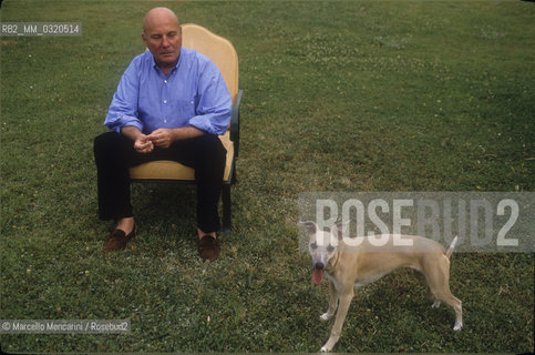 Marino (Rome), 1991. German composer Hans Werner Henze with a dog in the garden of his house / Marino (Roma), 1991. Il compositore Hans Werner Henze con un cane nel giardino della sua casa - ©Marcello Mencarini/Rosebud2