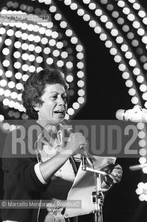 Rome, Piazza di Siena, 1980. Second Festival of the Poets. Italian poet Iolanda Insana reading some poems of hers/ Roma, piazza di Siena, 1980. Secondo Festival dei poeti. La poetessa Iolanda Insana mentre legge alcune sue poesie - ©Marcello Mencarini/Rosebud2