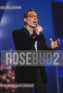 Sanremo Music Festival 1989. Italian singer-songwriter Enzo Jannacci performing his song Se me lo dicevi prima classified as seventeenth / Festival di Sanremo 1989. Enzo Jannacci canta Se me lo dicevi prima, classificata al diciassettesimo posto - ©Marcello Mencarini/Rosebud2