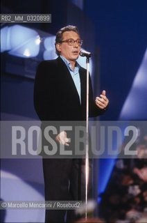 Sanremo Music Festival 1989. Italian singer-songwriter Enzo Jannacci performing his song Se me lo dicevi prima classified as seventeenth / Festival di Sanremo 1989. Enzo Jannacci canta Se me lo dicevi prima, classificata al diciassettesimo posto - ©Marcello Mencarini/Rosebud2