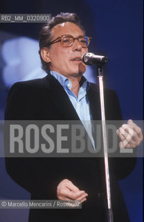 Sanremo Music Festival 1989. Italian singer-songwriter Enzo Jannacci performing his song Se me lo dicevi prima classified as seventeenth / Festival di Sanremo 1989. Enzo Jannacci canta Se me lo dicevi prima, classificata al diciassettesimo posto - ©Marcello Mencarini/Rosebud2