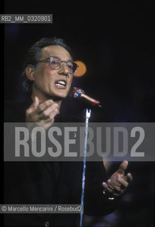 Sanremo Music Festival 1991. Italian singer-songwriter Enzo Jannacci performing his song La fotografia classified as eleventh / Festival di Sanremo 1991. Enzo Jannacci canta La fotografia, classificata allundicesimo posto - ©Marcello Mencarini/Rosebud2