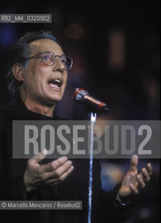 Sanremo Music Festival 1991. Italian singer-songwriter Enzo Jannacci performing his song La fotografia classified as eleventh / Festival di Sanremo 1991. Enzo Jannacci canta La fotografia, classificata allundicesimo posto - ©Marcello Mencarini/Rosebud2