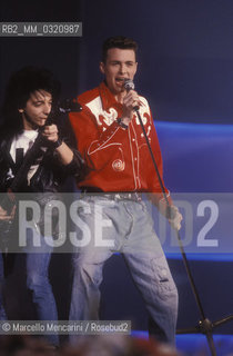 Sanremo Music Festival 1989. Italian pop singer Jovanotti (real name: Lorenzo Cherubini) performing the song Vasco (ranked fifth) / Festival di Sanremo 1989. Jovanotti (Lorenzo Cherubini) canta Vasco (quinta classificata) - ©Marcello Mencarini/Rosebud2