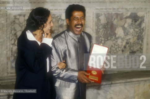 Venice Film Festival 1993. Actress Valeria Golino gives to musician Cheb Khaled the Osella doro award for music of movie Un Deux Trois Soleil directed by Bertrand Blier / Mostra del Cinema di Venezia 1993. Lattrice Valeria Golino consegna al musicista Cheb Chaled  il premio Osella doro per la musica del film Un deux Trois Soleil diretto da Bertrand Blier - ©Marcello Mencarini/Rosebud2