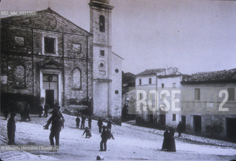 Recanati (Macerata). Square of Sabato del Villaggio (Sathurday in the Village) in front of Santa Maria di Monte Morello Church in about 1930. This square take its name from a poem by Giacomo Leopardi, born in Recanati in 1798 / Recanati (Macerata). Piazzuola del Sabato del villaggio davanti alla chiesa di Santa Maria di Montemorello nel 1930 circa. Questa piazza prende il nome da una poesia di Giacomo Leopardi che nacque a Recanati nel 1798 - ©Marcello Mencarini/Rosebud2