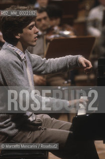 Rome, RAI Auditorium at Foro Italico, about 1982. German classical pianist Alexander Lonquich during a rehearsal / Roma, Auditorium RAI del Foro Italico, 1982 circa. Il pianista Alexander Lonquich durante una prova - ©Marcello Mencarini/Rosebud2