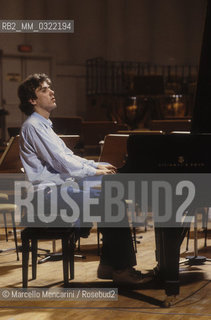 Rome, RAI Auditorium at Foro Italico, about 1982. German classical pianist Alexander Lonquich during a rehearsal / Roma, Auditorium RAI del Foro Italico, 1982 circa. Il pianista Alexander Lonquich durante una prova - ©Marcello Mencarini/Rosebud2