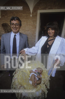 Venice about 1985. Mayor of Venice Nereo Laroni and fashion stylist Fiorella Mancini with her daughter on the day of her baptism / Venezia 1985 circa. Il sindaco di Venezia Nereo Laroni e lastilista Fiorella Mancini con la figlia nel giorno del suo battesimo - ©Marcello Mencarini/Rosebud2