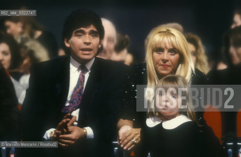 Argentine soccer player Diego Armando Maradona, his wife Claudia and one of their two daughter, 1991 /  Il calciatore Diego Armando Maradona, sua moglie Claudia e una delle loro figlie figlia, 1991 - ©Marcello Mencarini/Rosebud2