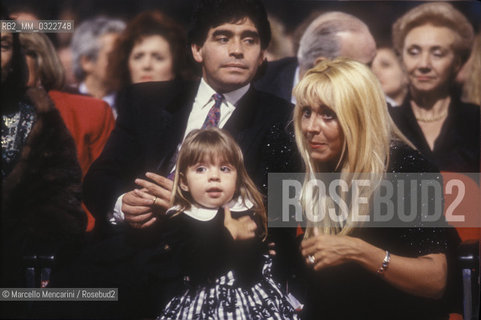 Argentine soccer player Diego Armando Maradona, his wife Claudia and one of their two daughter, 1991 /  Il calciatore Diego Armando Maradona, sua moglie Claudia e una delle loro figlie figlia, 1991 - ©Marcello Mencarini/Rosebud2