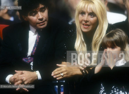 Argentine soccer player Diego Armando Maradona, his wife Claudia and one of their two daughter, 1991 /  Il calciatore Diego Armando Maradona, sua moglie Claudia e una delle loro figlie figlia, 1991 - ©Marcello Mencarini/Rosebud2