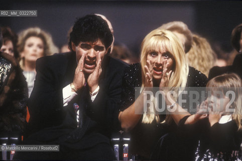 Argentine soccer player Diego Armando Maradona, his wife Claudia and one of their two daughter, 1991 /  Il calciatore Diego Armando Maradona, sua moglie Claudia e una delle loro figlie figlia, 1991 - ©Marcello Mencarini/Rosebud2