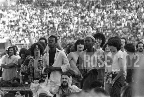 Milan, San Siro Stadium, June 27, 1980. Audience at the concert of Bob Marley / Milano, Stadio San Siro, 27 giugno 1980. Pubblico al concerto di Bob Marley - ©Marcello Mencarini/Rosebud2