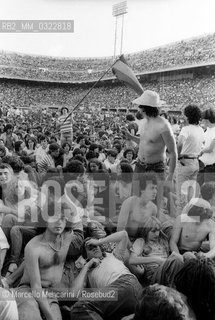 Milan, San Siro Stadium, June 27, 1980. Audience at the concert of Bob Marley / Milano, Stadio San Siro, 27 giugno 1980. Pubblico al concerto di Bob Marley - ©Marcello Mencarini/Rosebud2