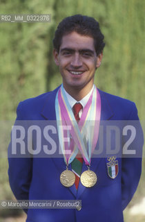 Rome, 1984. Italian pentathlete Daniele Masalab showing the two golden medals for both individual and team competitions, won at the Los Angeles Olympic Games / Roma, 1984. Il pentatleta Daniele Masala mostra le due medaglie doro, individuale e a squadre, vinte alle Olimpiadi di Los Angeles - ©Marcello Mencarini/Rosebud2