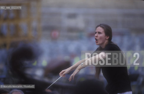 Sferisterio in Macerata, 1991. Italian conductor Elisabetta Maschio performing a rehearsal / Sferisterio di Macerata 1991. Il direttore dorchestra Elisabetta Maschio dirige una prova - ©Marcello Mencarini/Rosebud2