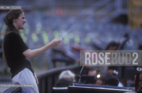 Sferisterio in Macerata, 1991. Italian conductor Elisabetta Maschio performing a rehearsal / Sferisterio di Macerata 1991. Il direttore dorchestra Elisabetta Maschio dirige una prova - ©Marcello Mencarini/Rosebud2