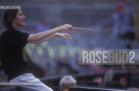 Sferisterio in Macerata, 1991. Italian conductor Elisabetta Maschio performing a rehearsal / Sferisterio di Macerata 1991. Il direttore dorchestra Elisabetta Maschio dirige una prova - ©Marcello Mencarini/Rosebud2