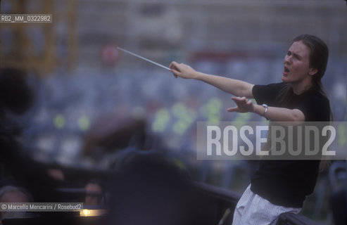 Sferisterio in Macerata, 1991. Italian conductor Elisabetta Maschio performing a rehearsal / Sferisterio di Macerata 1991. Il direttore dorchestra Elisabetta Maschio dirige una prova - ©Marcello Mencarini/Rosebud2