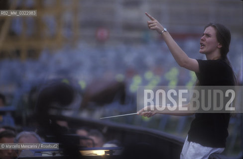 Sferisterio in Macerata, 1991. Italian conductor Elisabetta Maschio performing a rehearsal / Sferisterio di Macerata 1991. Il direttore dorchestra Elisabetta Maschio dirige una prova - ©Marcello Mencarini/Rosebud2